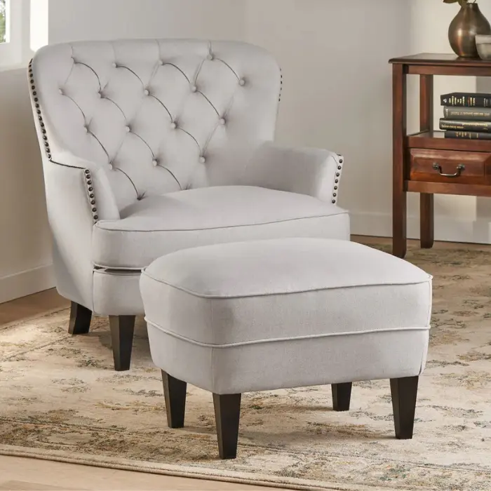Windsor Club Chair with Ottoman Windsor Club Chair with Ottoman featuring button-tufted design, nailhead trim, and plush fabric upholstery in Pakistan and UAE.