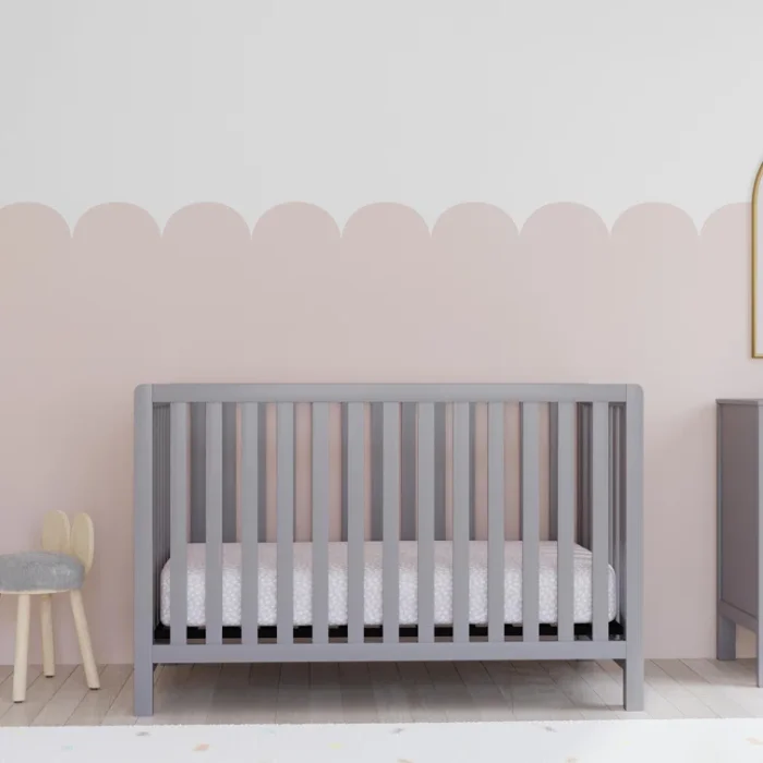 Soft Whisper 4-in-1 Convertible Crib Gray 1 Soft Whisper 4-in-1 Convertible Crib - Gray, Wooden Slatted Crib with Soft Mattress in Modern Nursery Setting