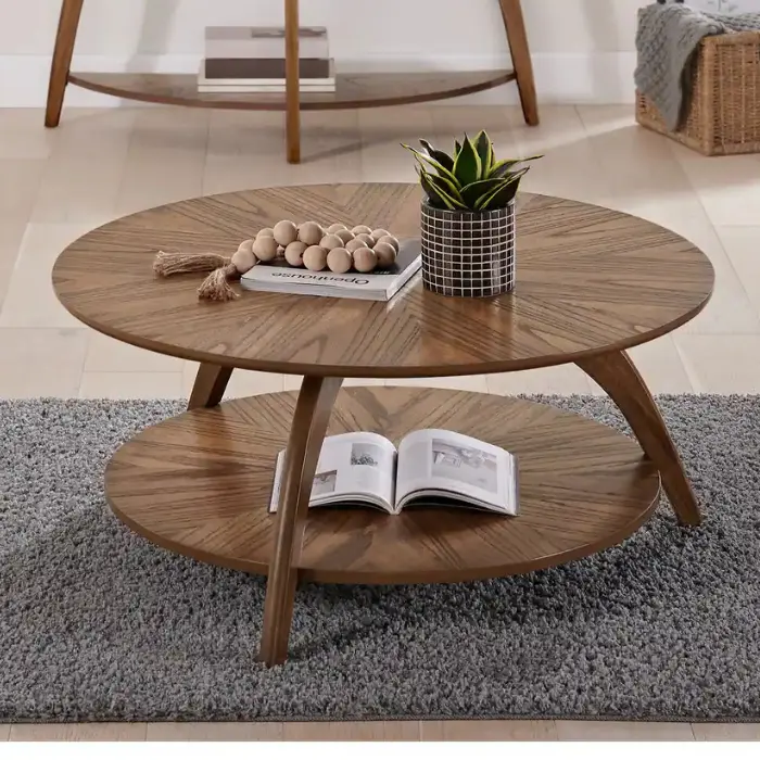 Solaris Table Solaris round coffee table with starburst design in nutmeg brown finish, featuring a lower storage shelf, perfect for modern and premium living spaces.