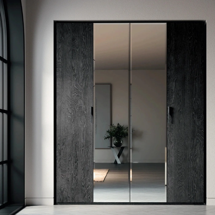 Eclipse Wardrobe (2) Eclipse Wardrobe with charcoal wood sides and mirrored sliding doors in a modern bedroom