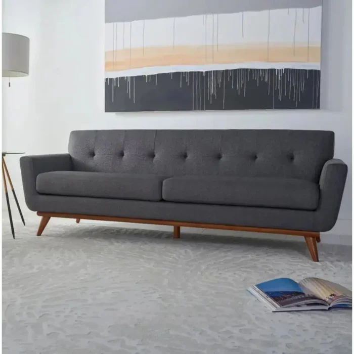 Allure Upholstered Comfort Sofa gray 2 Allure Upholstered Comfort Sofa in gray, featuring a sleek mid-century modern design with tufted cushions and wooden legs, perfect for adding style and comfort to any living room