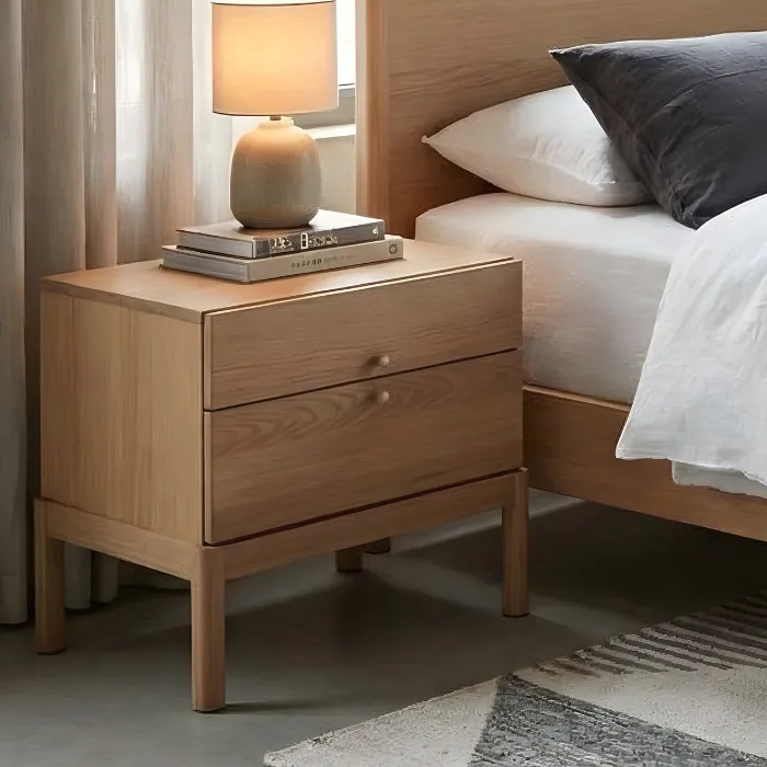 Roco Side Table Roco Side Table – modern light oak side table with two drawers and brass knobs, featuring a clean and minimal design.