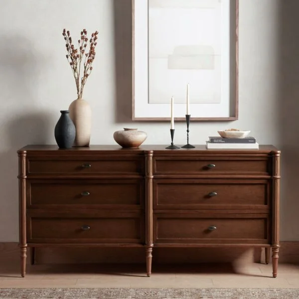 Aurela-Drawer-Dresser-Product-Img-600x600 Wooden dresser with six drawers in walnut finish, styled with minimalist décor and ceramic vases.