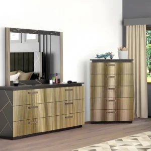 Modern bedroom scene featuring matching fluted-gold dresser and tall chest beside a window.